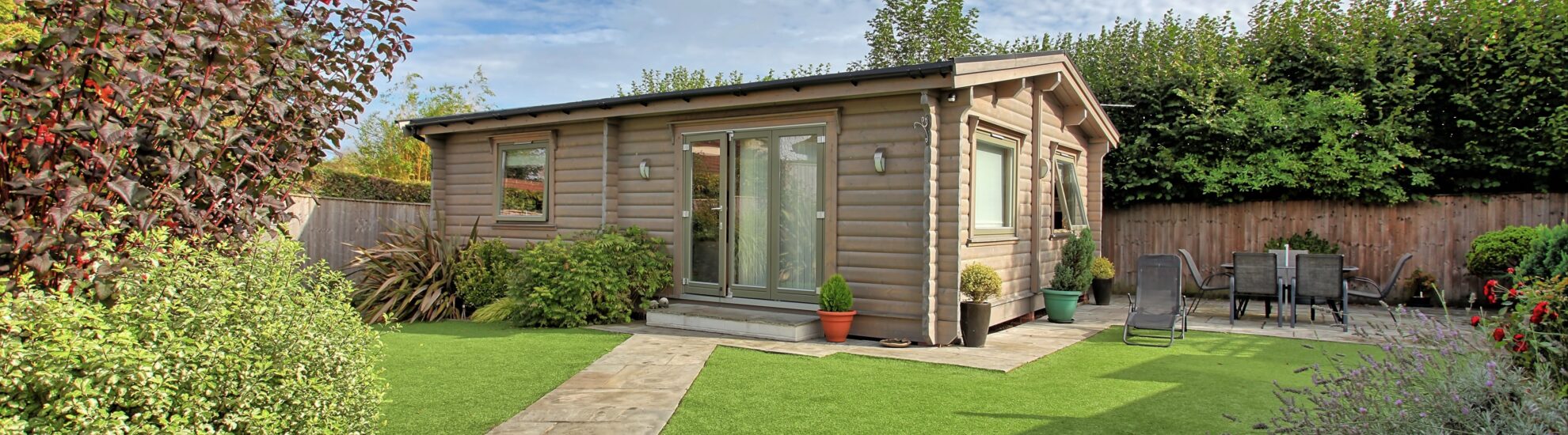 Granny Annexe at the bottom of a suburban garden with a path leading to the front door